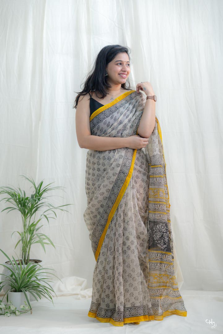 Beige and yellow kota doria saree