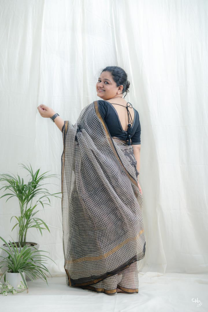 Beige and black kota doria