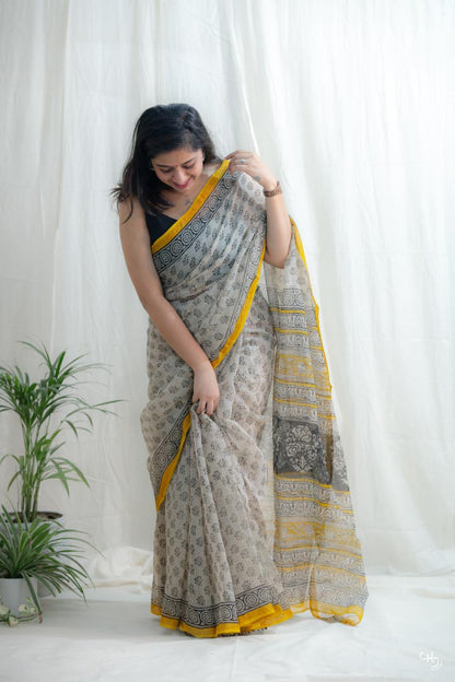 Beige and yellow kota doria saree