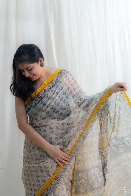 Beige and yellow kota doria saree