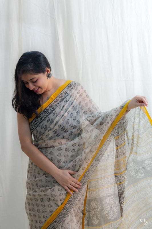 Beige and yellow kota doria saree