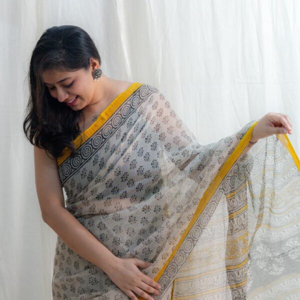 Beige and yellow kota doria saree